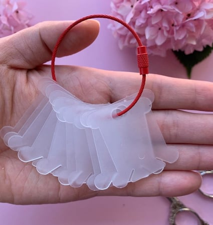 حلقة لتنظيم تاق الخيوط ملون