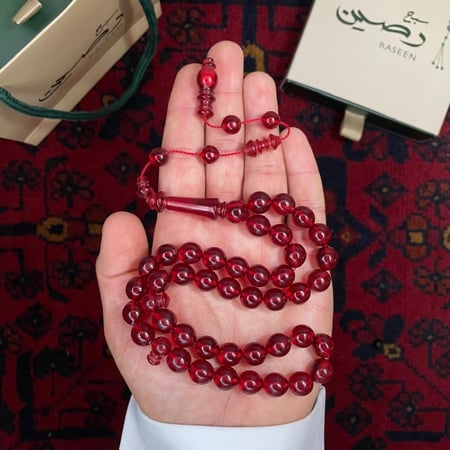 سبحة سندلس لون عنابي شفاف