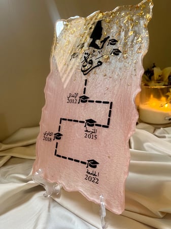 ستاند تخرج من الريزن | لون وردي