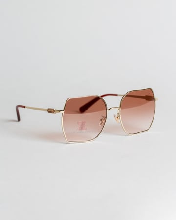 نظارة شمسية نسائية ماركة كوتش Shiny Light Gold