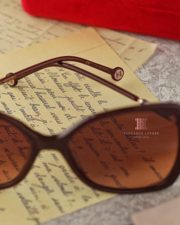 نظارة شمسية نسائية ماركة كارولينا هيريرا - Burgundy Buterfly