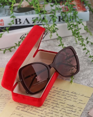 نظارة شمسية نسائية ماركة كارولينا هيريرا - Burgundy Buterfly