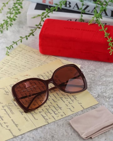 نظارة شمسية نسائية ماركة كارولينا هيريرا - Burgundy Buterfly