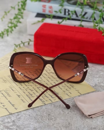 نظارة شمسية نسائية ماركة كارولينا هيريرا - Burgundy Buterfly