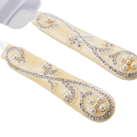 جاروف مع سكين لتقطيع الكيك