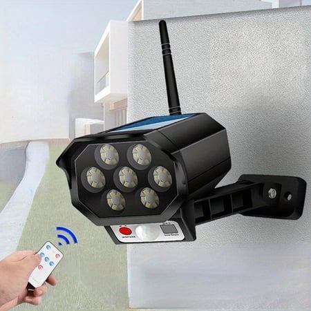 كشاف طاقة شمسية شكل كاميرا خارجية وهمية مع استشعار حركة