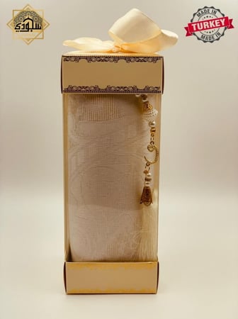 علبة سجادة وسبحة