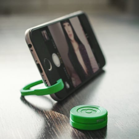 قاعدة للجوال و زر تصوير