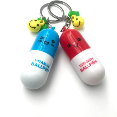 كبسولة ميدالية المفاتيح - قلم