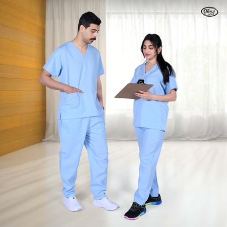 طقم سكراب طبي كنزي للجنسين لون سماوي بجيوب ومغاط من الخصر