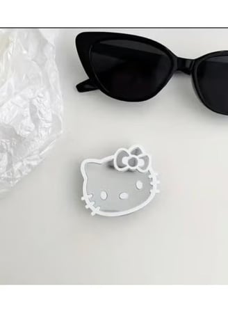 هيلو كيتي باي سانريو مقبس قبضة هاتف منبثق على شكل هالو كيتي قابل للتعديل مع حامل للهواتف الذكية والكمبيوتر اللوحي- Hello Kitty by Sanrio Adjustable Hello Kitty Pop-Up Phone Grip Socket with Smartphone and Tablet Holder