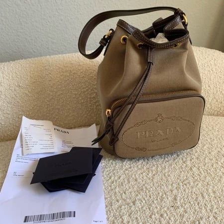 شنطه برادا اصلية شعار الجاكار شامل الملحقات