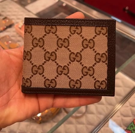 محفظة قوتشي الرجالية