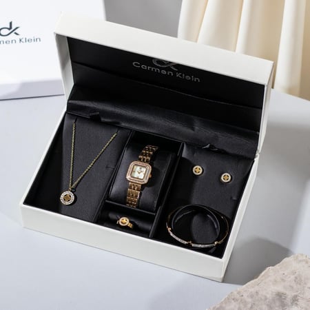 طقم نسائي كارمن كلاين ستيل ذهبي
