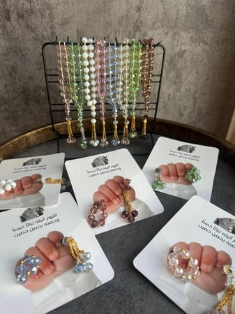 تصاميم لتوزيعات مسبحه للمواليد اقل عدد لطلب 18 حبه