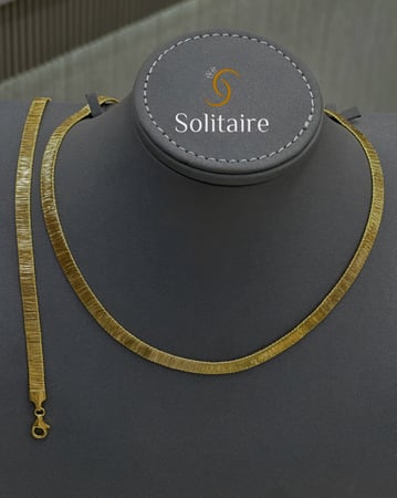 عقد وسوارة الحرير 18k