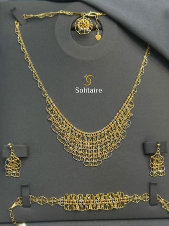 طقم يباني ذهب خالص18k