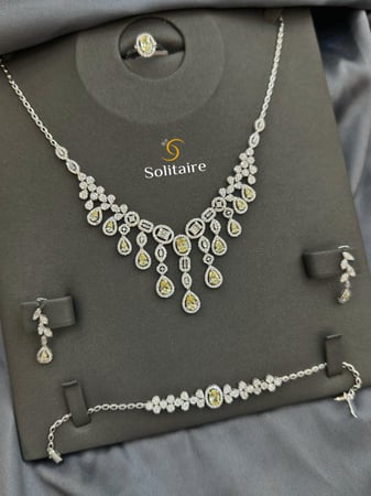 طقم تطبيق الالماس فانسي 18k