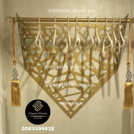 علاقة ملابس جدارية ذهبي لتعليق عباياتك بتميز - متجر الكرسي الذهبي