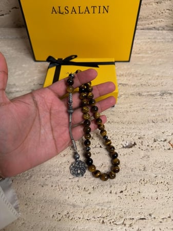 سبحة من حجر عين النمر مع طربزونه فضة