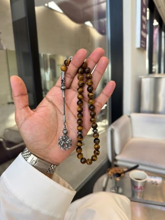 سبحة من حجر عين النمر مع طربزونه فضة