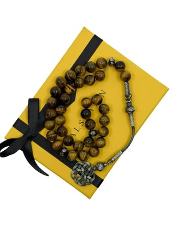 سبحة من حجر عين النمر مع طربزونه فضة