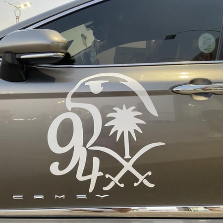 شعار الصقر 95 مع سيفين ونخلة جهتين