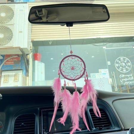 تعليقة ريش وردي