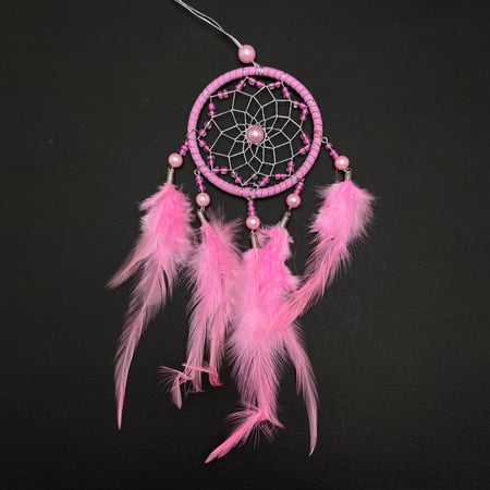 تعليقة ريش وردي