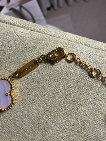إسوارة Van cleef ذهبي - فيروزي مخطط