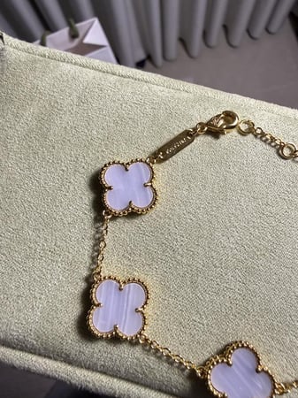 إسوارة Van cleef ذهبي - فيروزي مخطط