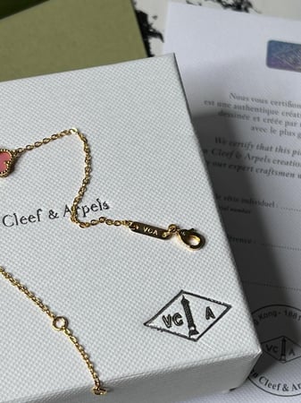 إسوارة Van cleef ذهبي _ وردي