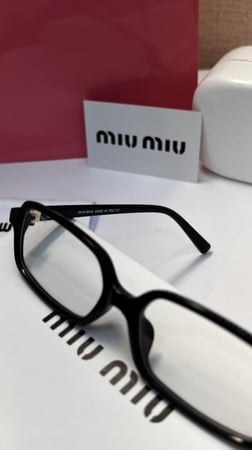 نظارة miu miu أطار أسود - عدسة شفافة