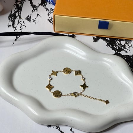 إسوارة LOUIS VUITTON معدن ذهبي