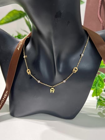 سلسال AIGNER ذهبي