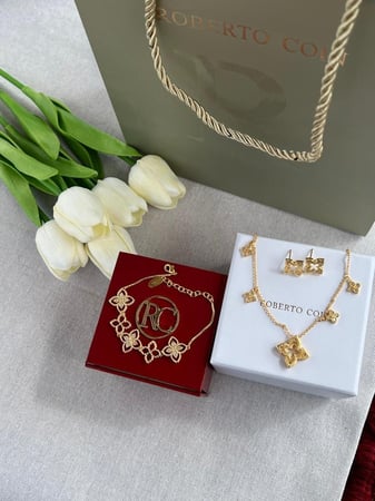 طقم roberto coin ذهبي