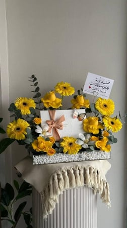 ستاند زهور الجربيرا مع شوكولاته هانوفريان