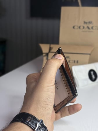 كوتش محفظة بطاقات ونقود مطوية