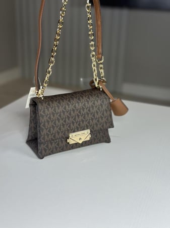 شنطة cece  سمول كروس بودي - بني سجنشر/ ذهبي