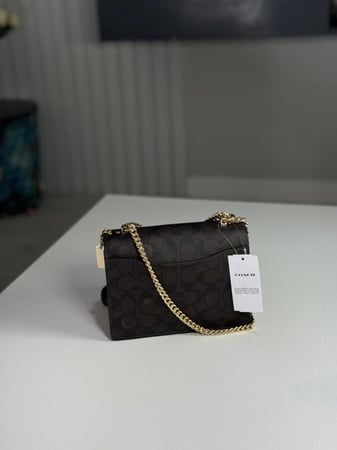 شنطة كوتش كلير اكس سمول بلون بني سجنشر / اسود Mini Klare Crossbody Bag