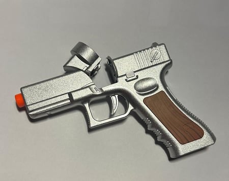 مسدس لعبة حديد طرطعان نص فضي