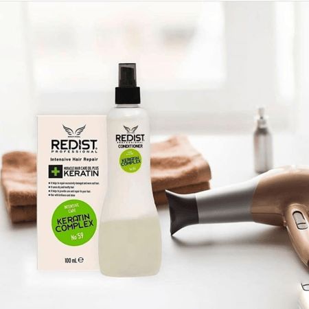 بخاخ بلسم فك تشابك الشعر بالكيراتين من ريديست 400 مل