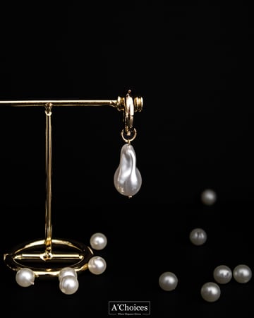 اقراط ذهبية باللؤلؤ الزراعي الكبير