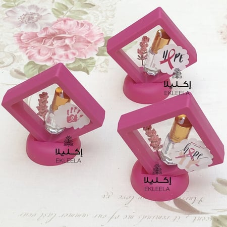 توزيعات علب بلاستيك مع تعبيه بثيم ورقي للتوعيه بسرطان الثدي ( 12 قطعه )