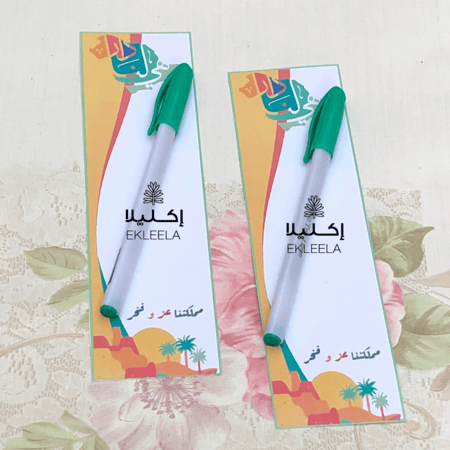 توزيعات اقلام مع ثيم ورقي لليوم الوطني( 12 قطعه )