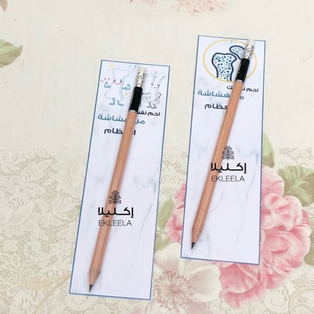 توزيعات اقلام مع ثيم ورقي عن هشاشة العظام ( 12 قلم )