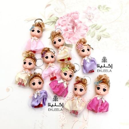 العاب اطفال / ميداليات عرايس للبنات ( 12 قطعه منوعه )