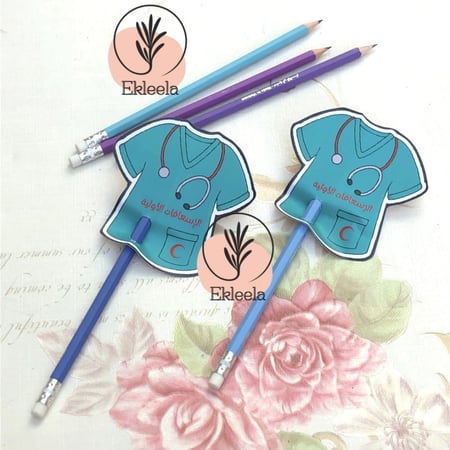 توزيعات اقلام مع ثيم ورقي عن الاسعافات الاولية  ( 12 قطعه )