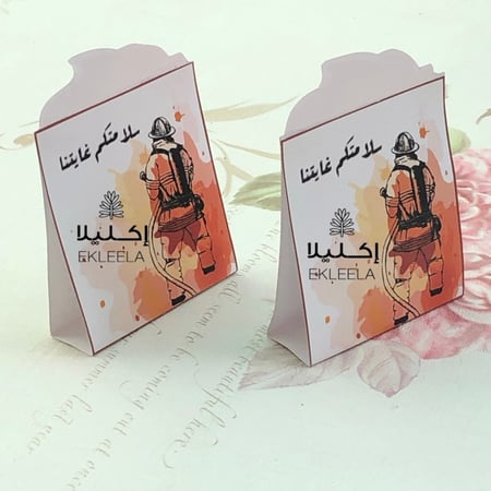 توزيعات بثيم ورقي عن اليوم العالمي للدفاع المدني مع تعبيه ( 12 قطعه )