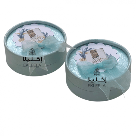 علب كرتونيه شكل دائري مع ثيم اليوم العالمي للغه العربيه ( 12 علبه )